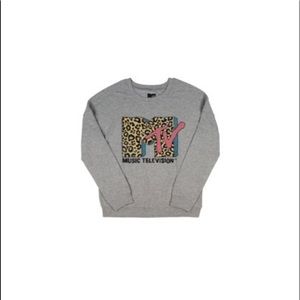 A pink and blue cheetah printed MTV sweatshirt